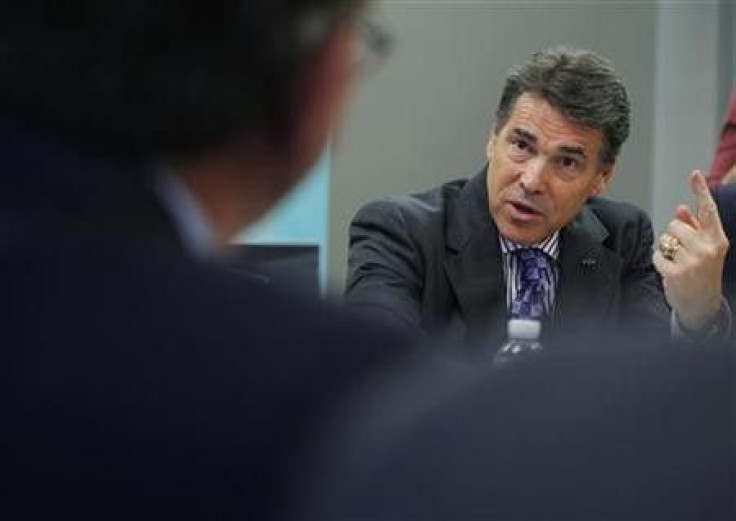 Republican presidential candidate Texas Governor Rick Perry speaks at a business roundtable at Resonetics Laser Micromachining in Nashua, New Hampshire