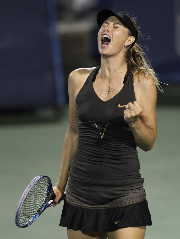 Maria Sharapova of Russia reacts after winning fifth game in the third set against Vera Zvonareva of Russia during their semi-final round match of the 2011 Cincinnati Open tennis tournament in Cincinnati