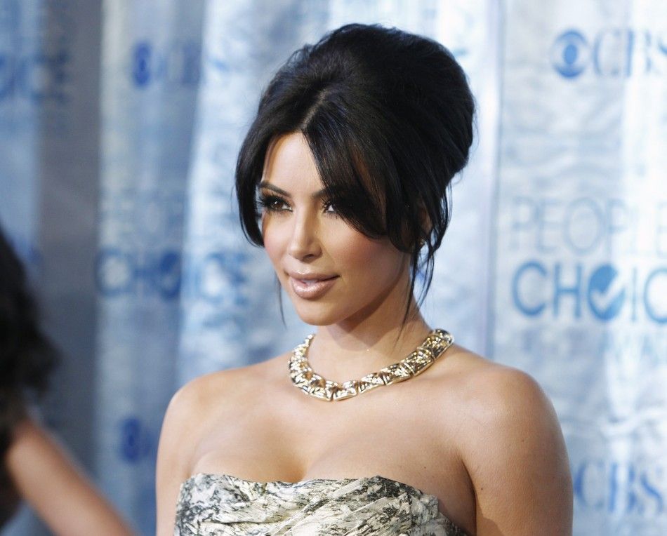 Reality TV star Kim Kardashian arrives at the 2011 Peoples Choice Awards in Los Angeles