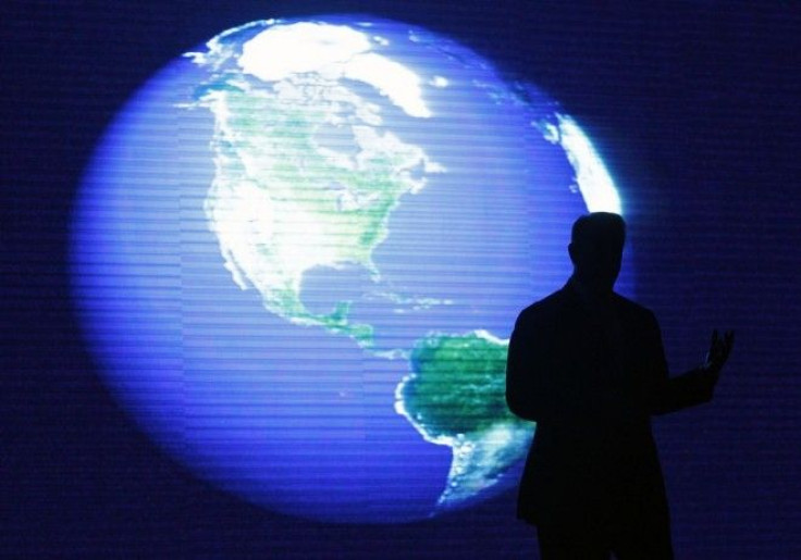 A silhouette shot of Al Gore, a U.S. former vice-president and Nobel Peace Prize Laureate, is seen in front of a monitor during his lecture on climate change inside a mall in Manila June 8, 2010. 