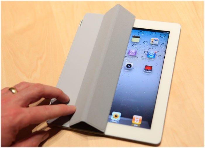 The iPad 2 with a Smart Cover is shown in use in the demonstration area after the iPad 2 launch during an Apple event in San Francisco, California March 2, 2011