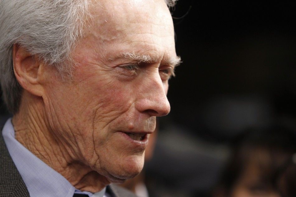 Director Clint Eastwood is interviewed as he arrives at the Museum of Tolerance International Film Festival gala awards presentation in his honor in Los Angeles