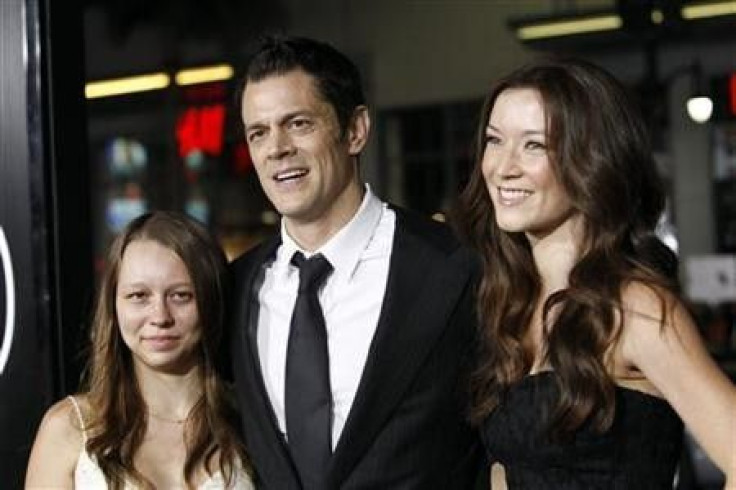 Cast member Johnny Knoxville with his wife Naomi Nelson (R) and daughter Madison pose at the premiere of &#039;&#039;Jackass 3D&#039;&#039; at Grauman&#039;s Chinese theatre in Hollywood, California
