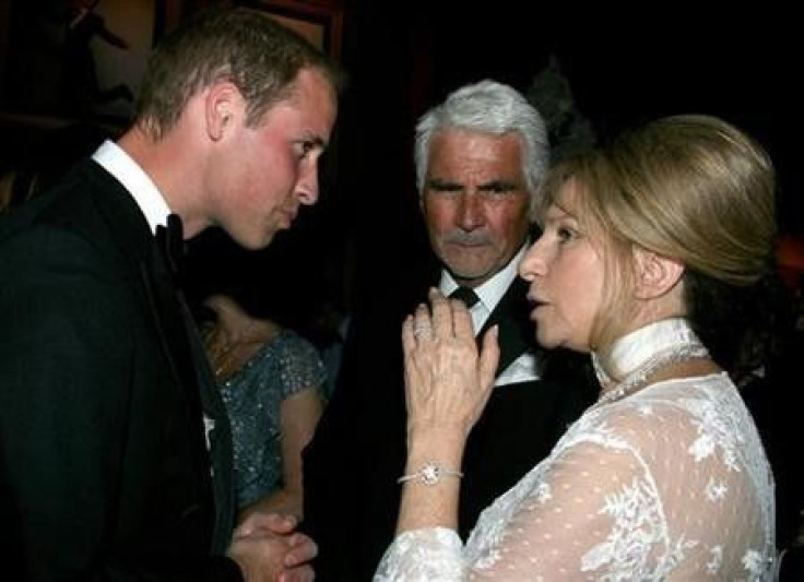 Britain&#039;s Prince William speaks to actress Barbra Streisand and her husband James Brolin at the BAFTA Brits to Watch event in Los Angeles