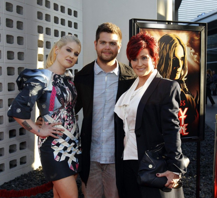 Director Jack Osbourne (C) poses with his mother Sharon Osbourne (R) and his sister Kelly Osbourne at a private preview of the documentary &quot;God Bless Ozzy Osbourne&quot; at the Arclight Cinerama Dome in Hollywood, California
