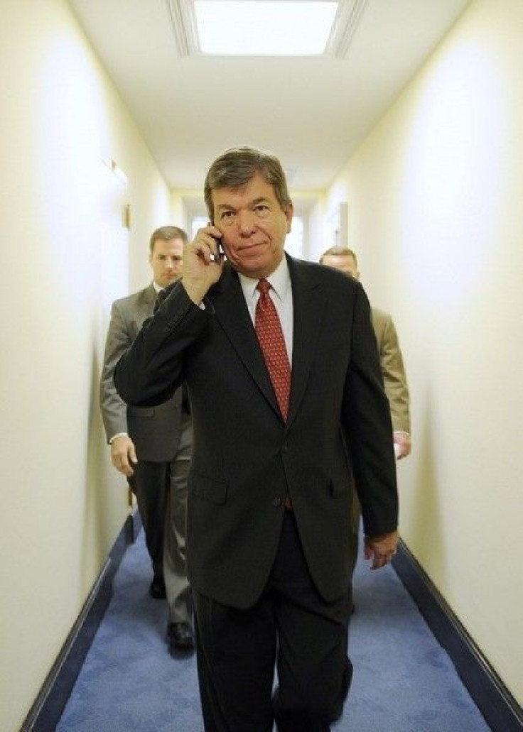 US Rep. Roy Blunt (R-MO) walks to his office to call fellow Republicans to rally support for a bill to provide a $700 billion bailout for the financial and banking crisis.