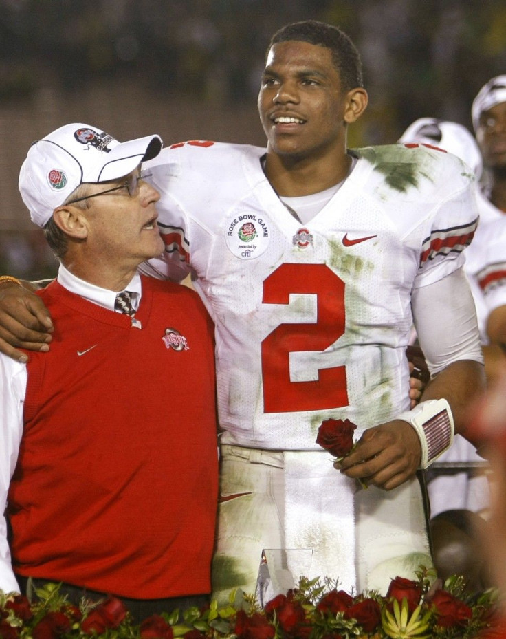 Ohio State Buckeyes head coach Jim Tressel (L) and quarterback Terrelle Pryor celebrate after beating the Oregon Ducks in the 96th Rose Bowl Game in Pasadena, California, January 1, 2010.