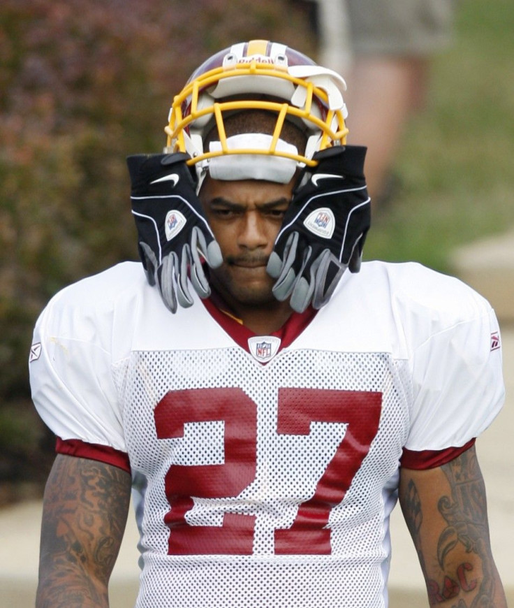 Washington Redskins running back Larry Johnson walks out to the practice field during their third day of NFL football training camp in Virginia
