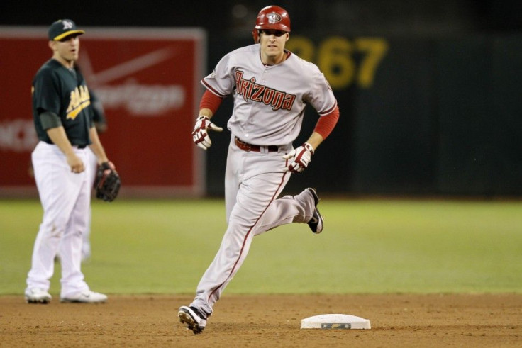 Diamondbacks Johnson rounds second base after hitting an eighth inning home run against Athletics during their MLB Interleague baseball game in Oakland