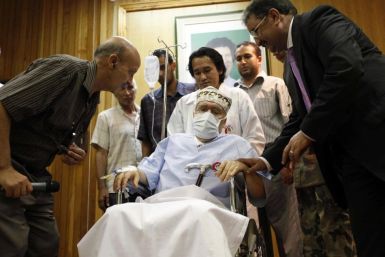 Abdel Basset al-Megrahi sits in a wheelchair in his room at a hospital in Tripoli