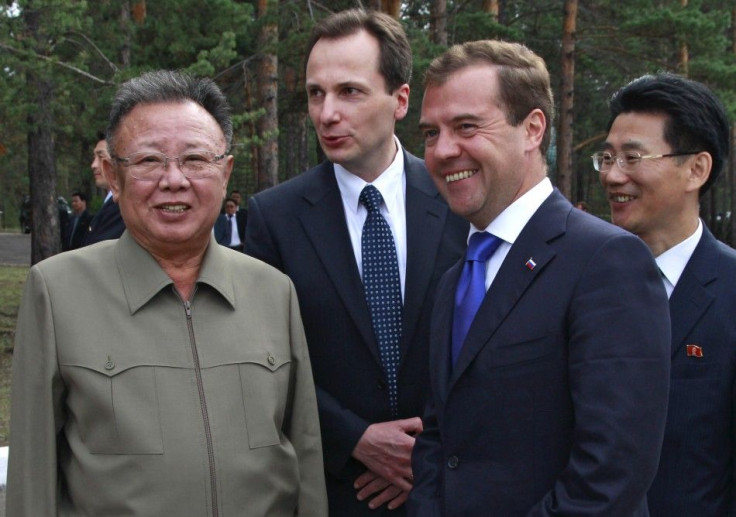 Russia&#039;s President Medvedev and North Korean leader Kim smile during their meeting at the &quot;Sosnovyi Bor&quot; military garrison in Siberia&#039;s Buryatia region
