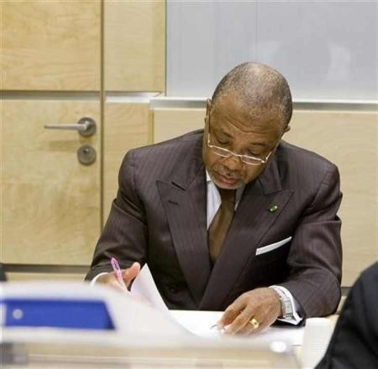 Former Liberian President Charles Taylor sits in the courtroom of the International Criminal Court (ICC) 