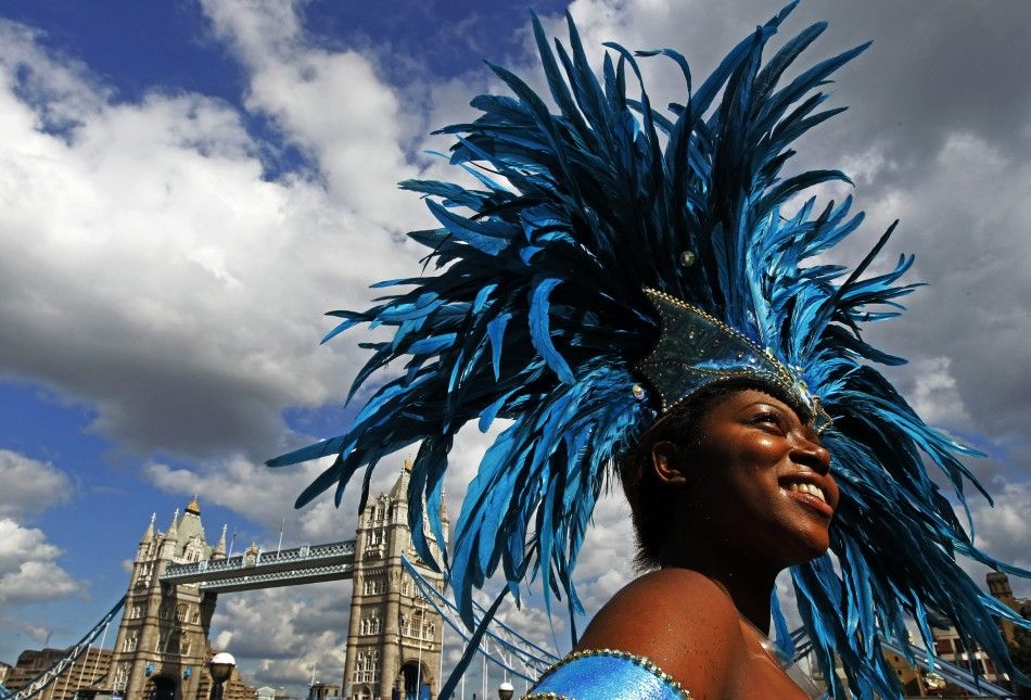 Saphra Bernard laughs during a photocall to promote the Notting Hill Carnival at City Hall in London 