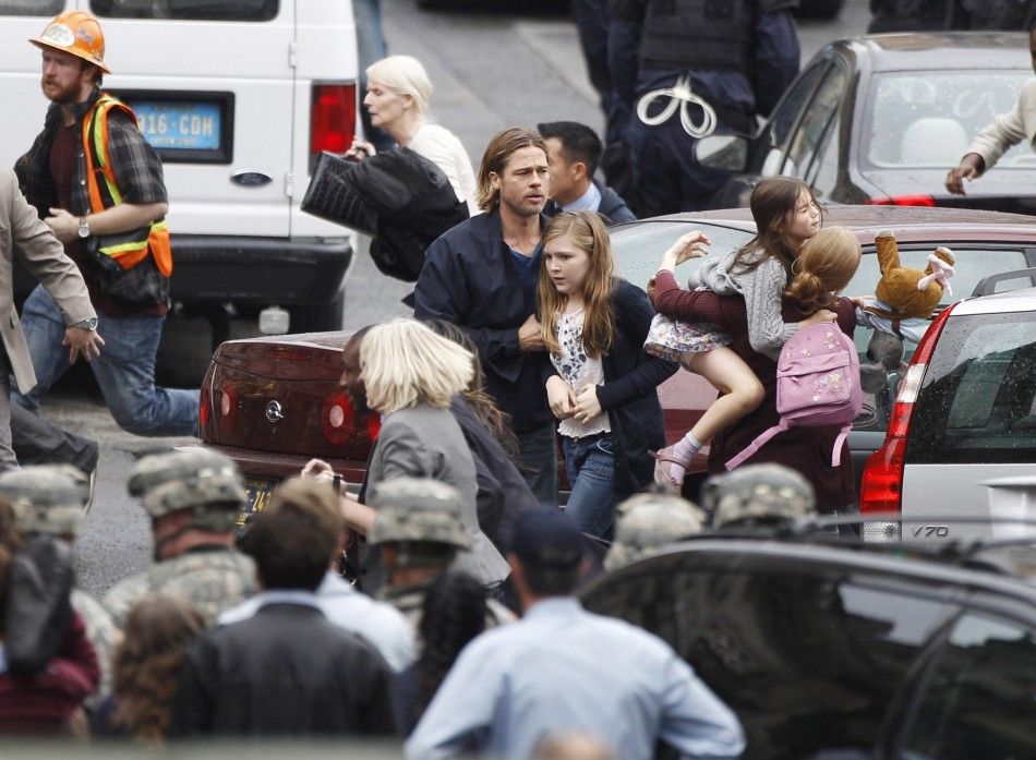 Actor Brad Pitt acts during the filming of zombie movie World War Z in Glasgow, Scotland 