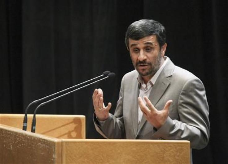 Iranian President Mahmoud Ahmadinejad gestures while speaking at a ceremony to mark the National Journalist Day in Tehran