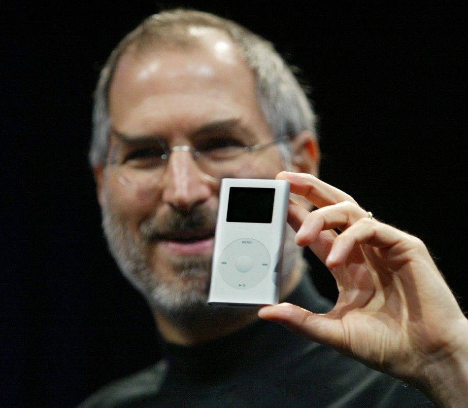 Apple CEO Steve Jobs introduces the new quotiPod miniquot digital music player at the 2004 Macworld Conference and Expo in San Francisco