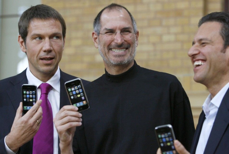 Deutsche Telekom AG Chief Executive Officer Rene Obermann, Apple Chief Executive Steve Jobs and T-Mobile Chief Executive Hamid Akhavan (L-R) pose for the media following their introduction of Apple's iPhone in Berlin 