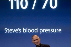 Steve Jobs, Apple Inc.'s Chief Executive Officer, makes a joke about his blood pressure after introducing the new laptop at a news conference in Cupertino, California