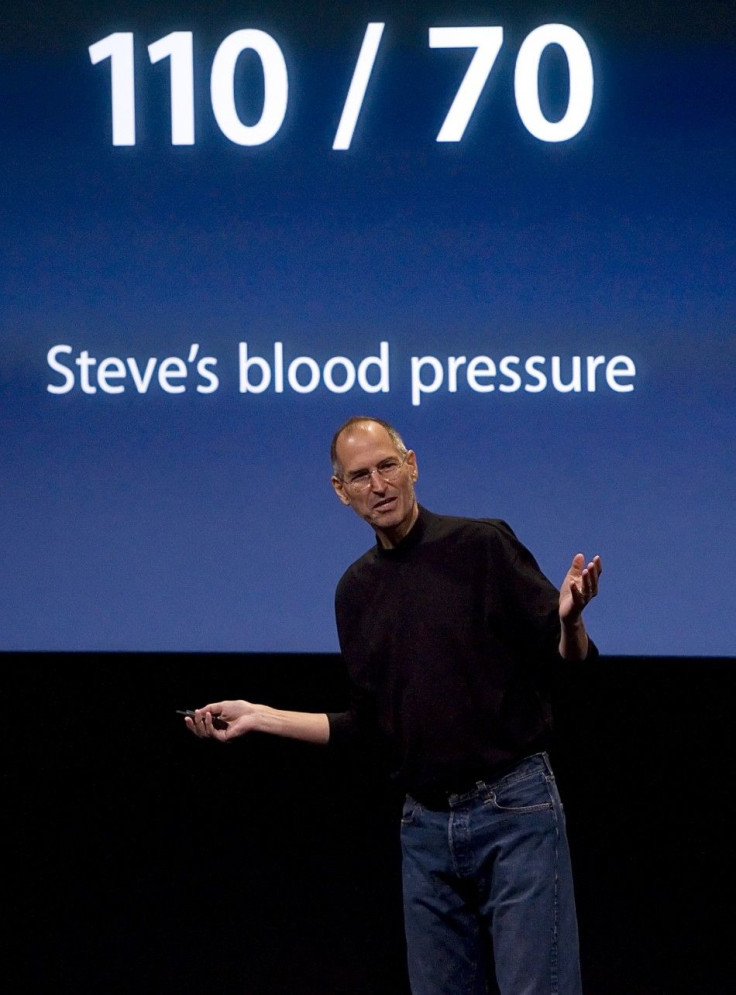 Steve Jobs, Apple Inc.'s Chief Executive Officer, makes a joke about his blood pressure after introducing the new laptop at a news conference in Cupertino, California