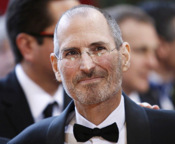 Apple Chief Executive Steve Jobs arrives with the team from the best picture nominate film &quot;Up&quot; at the 82nd Academy Awards in Hollywood 