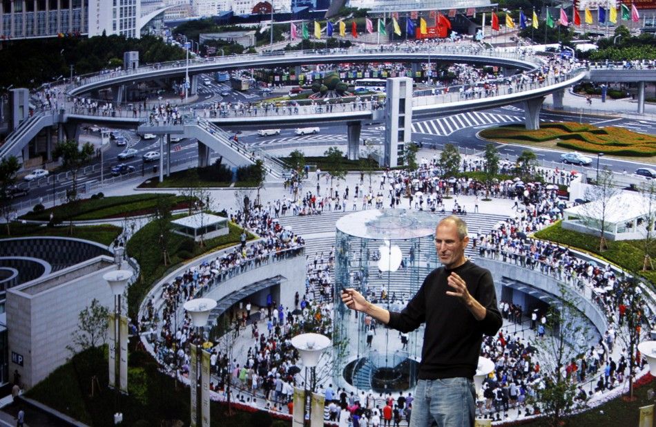 Apple Chief Executive Steve Jobs speaks on stage, with the Shanghai Apple store displayed on screen, at Apples music-themed September media event in San Francisco, California 