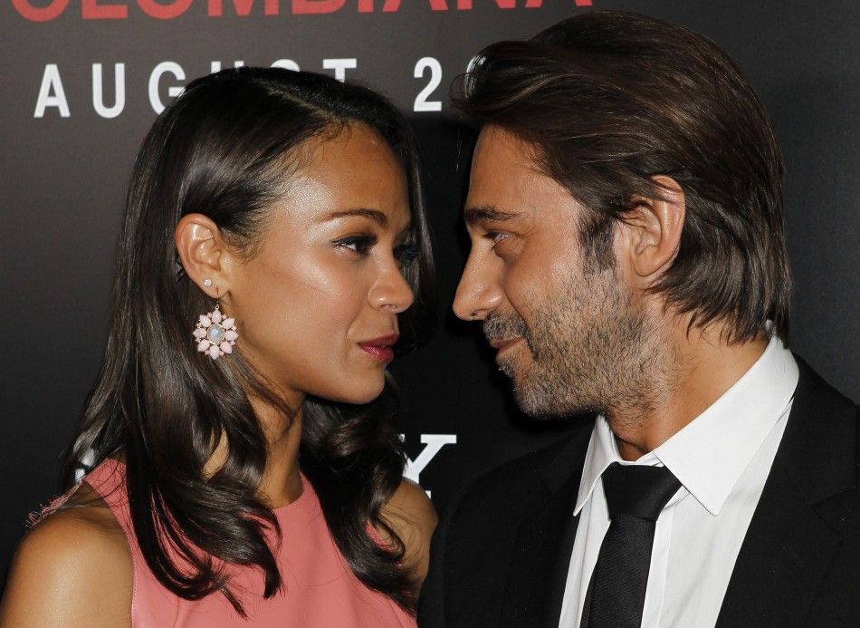 Actress Zoe Saldana and Spanish actor Jordi Molla arrive at a special screening of their new film quotColombianaquot in Los Angeles, California 