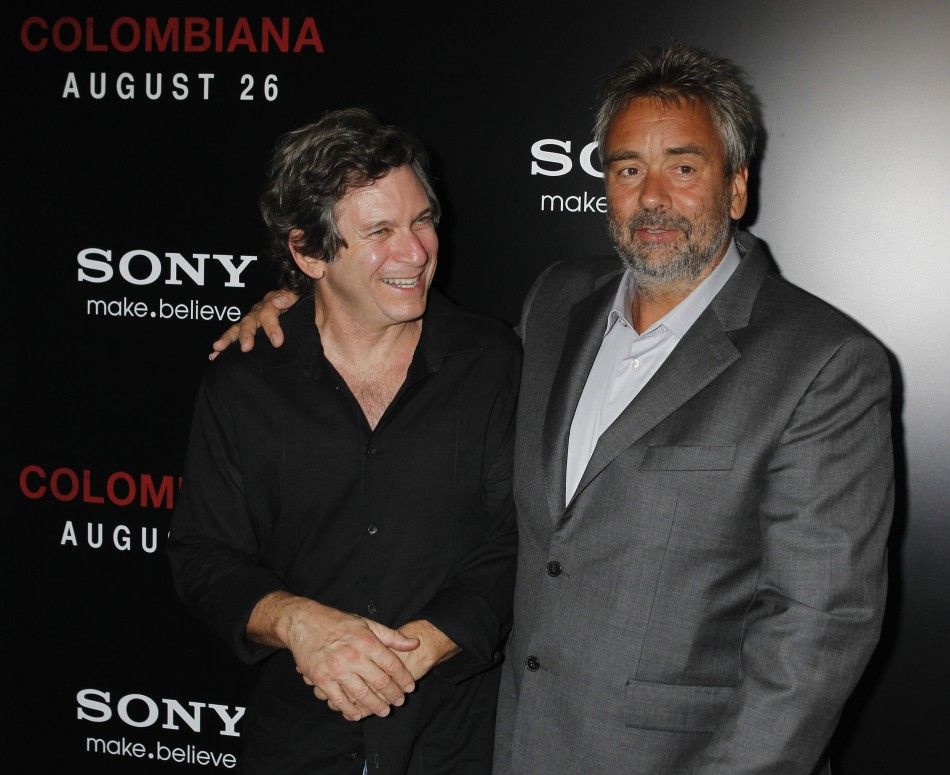 Writer Robert Kamen L and writer and producer Luc Besson arrive at a special screening of their new film quotColombianaquot in Los Angeles, California 