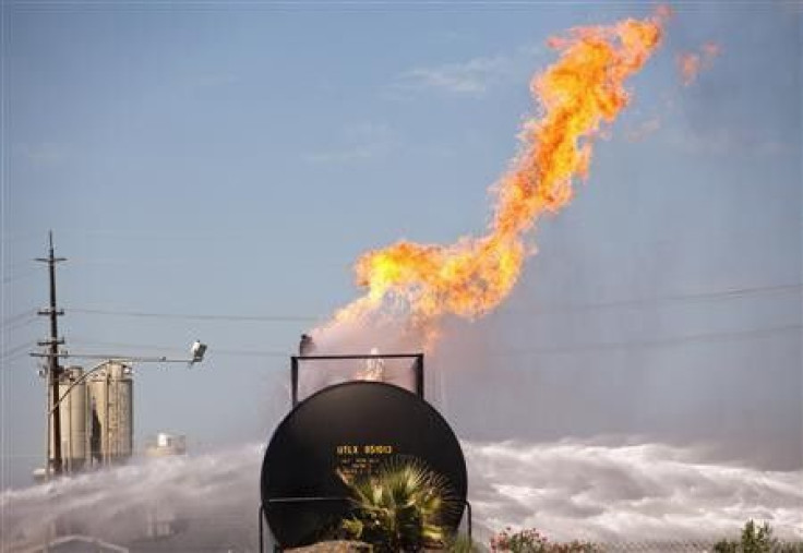 A rail tank car filled with propane continues to burn in Lincoln, California