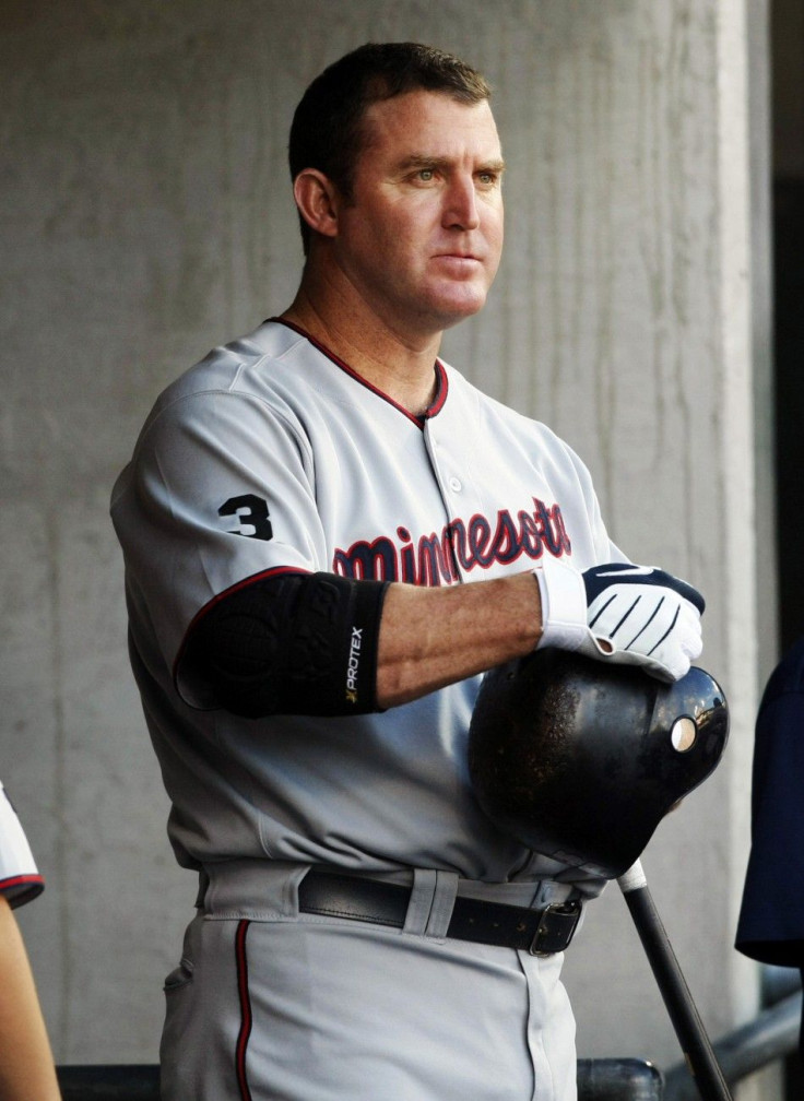 Minnesota Twins&#039; Thome stands in the dug-out as he waits for his turn to bat during their MLB American League baseball game against the Detroit Tigers in Detroit