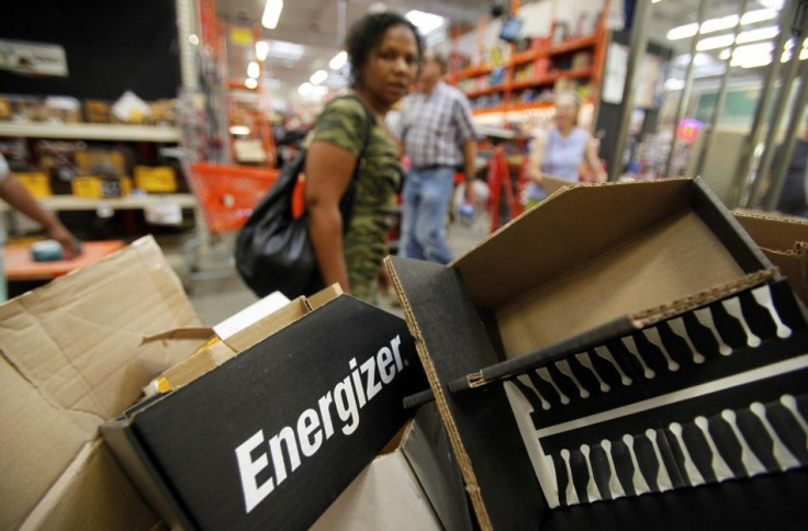 A woman walks past empty battery boxes at a Home Depot store in Freeport on Long Island, New York 