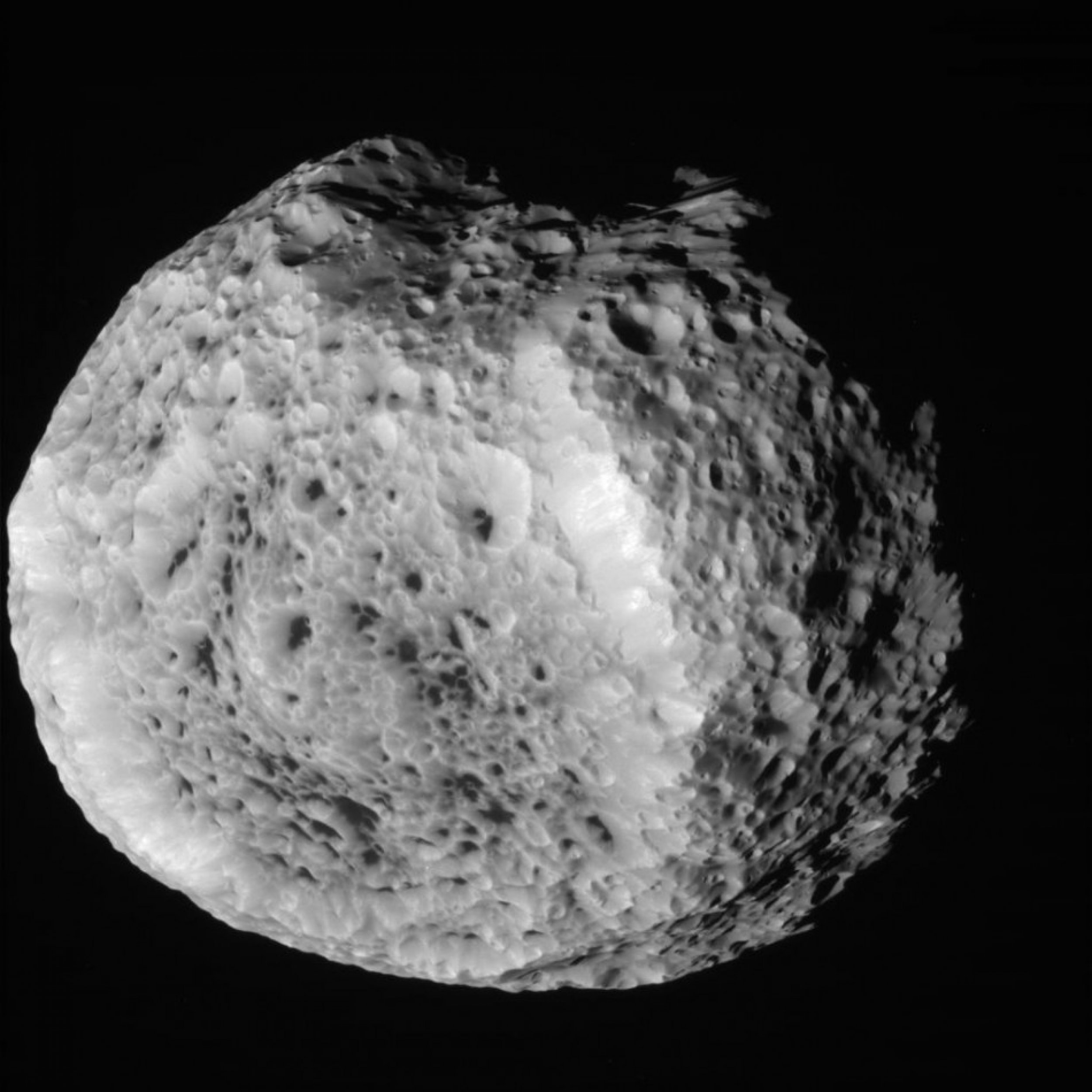 NASA Captures Spectacular Cosmic Images of Saturns Oddly Shaped Moon Hyperion.