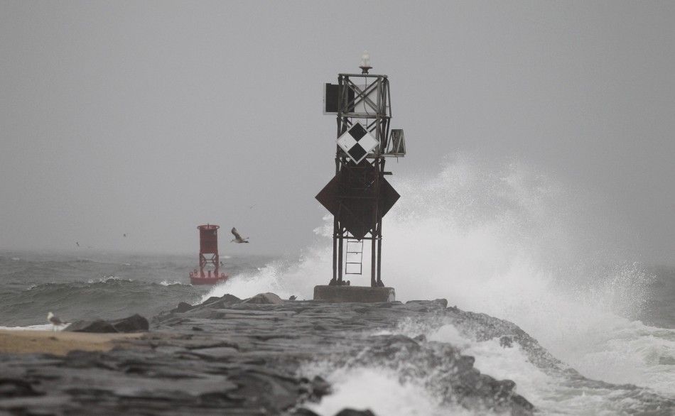 Waves crash on a breakwater during the early effects of Hurricane Irene in Ocean City, Maryland