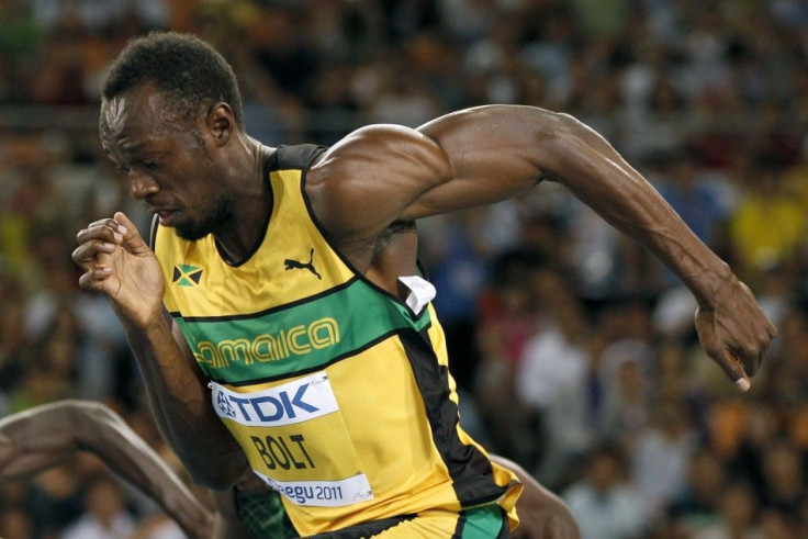 Usain Bolt of Jamaica sprints out of the starting blocks at the start of his men&#039;s 100 metres heats at the IAAF World Championships in Daegu