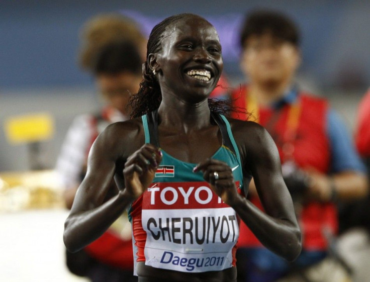 Cheruiyot of Kenya celebrates winning the women&#039;s 10,000 metres final at the IAAF World Championships in Daegu