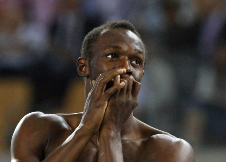 Bolt of Jamaica reacts after being disqualified for a false start in the men's 100 metres final at the IAAF World Championships in Daegu