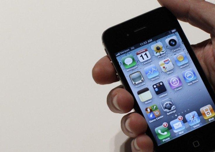 An Apple staff demonstrates the Verizon iPhone 4 at Verizon's iPhone 4 launch event in New York January 11, 2011