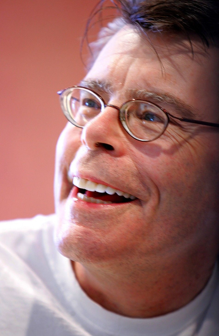Author Stephen King signs copies of his books, as part of The New Yorker Festival