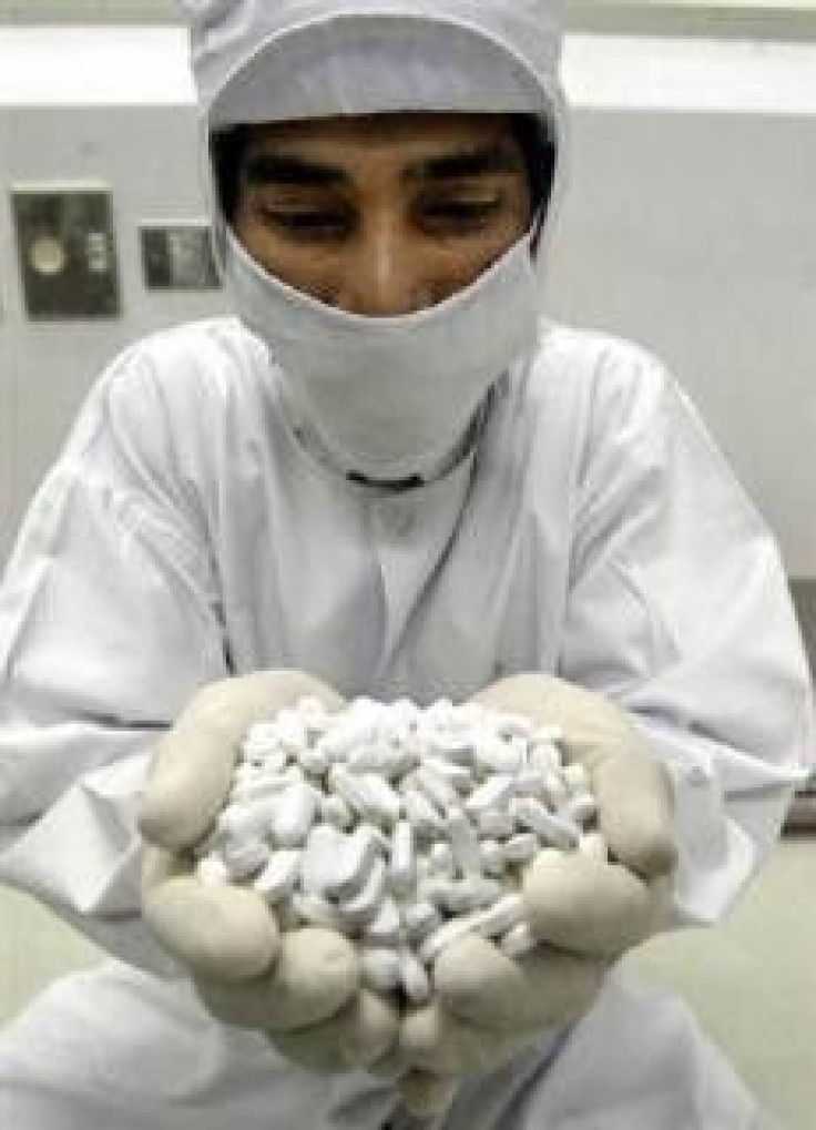 A Ranbaxy Laboratories technician displays tablets at their facility in Paonta Sahib in Himachal Pradesh.