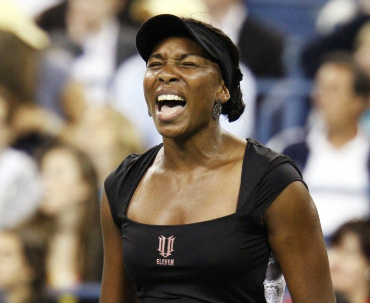 Williams of the U.S. reacts to a point during her first round match against Dolonts of Russia at the U.S. Open tennis tournament in New York