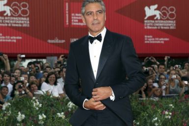 U.S. actor Clooney arrives on the &quot;The Ides of March&quot; red carpet at the 68th Venice Film Festival in Venice