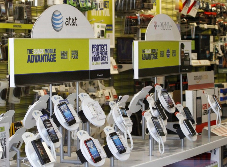 AT&T mobile phones are seen for sale alongside T-Mobile phones at a RadioShack electronics store in Los Angeles