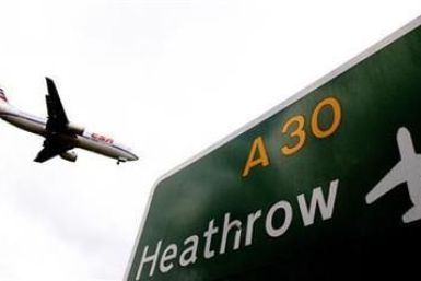 An aircraft prepares to land at Heathrow airport in London March 11, 2008. London's crowded Heathrow airport could almost double airline charges in the next five years, boosting its debt-laden Spanish owner but sparking fury among airlines that fly from t