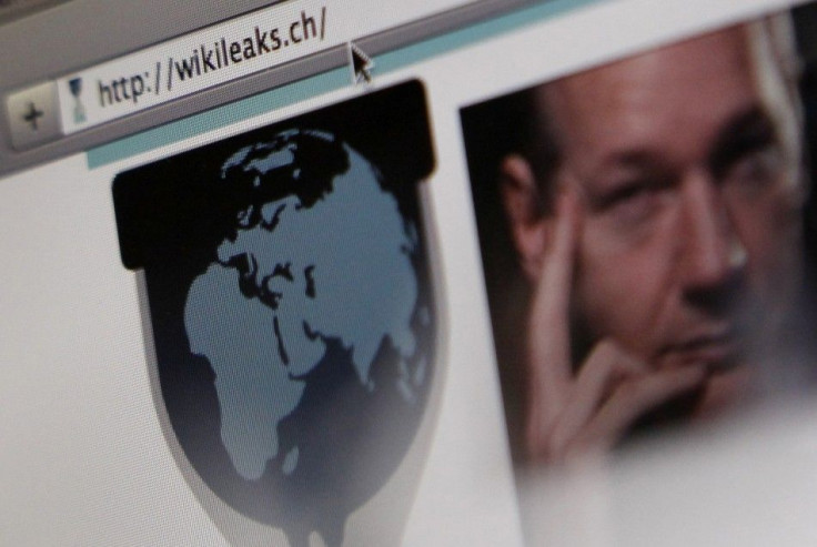 A screen shot of a web browser displaying the WikiLeaks website with a picture of its founder Julian Assange in Bern