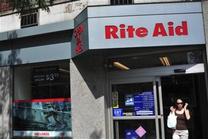 A shopper exits a Rite Aid store in New York