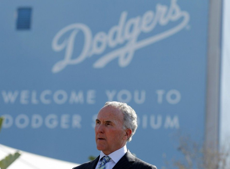 Los Angeles Dodgers owner Frank McCourt listens at a news conference about increased security at Dodger Stadium in Los Angeles