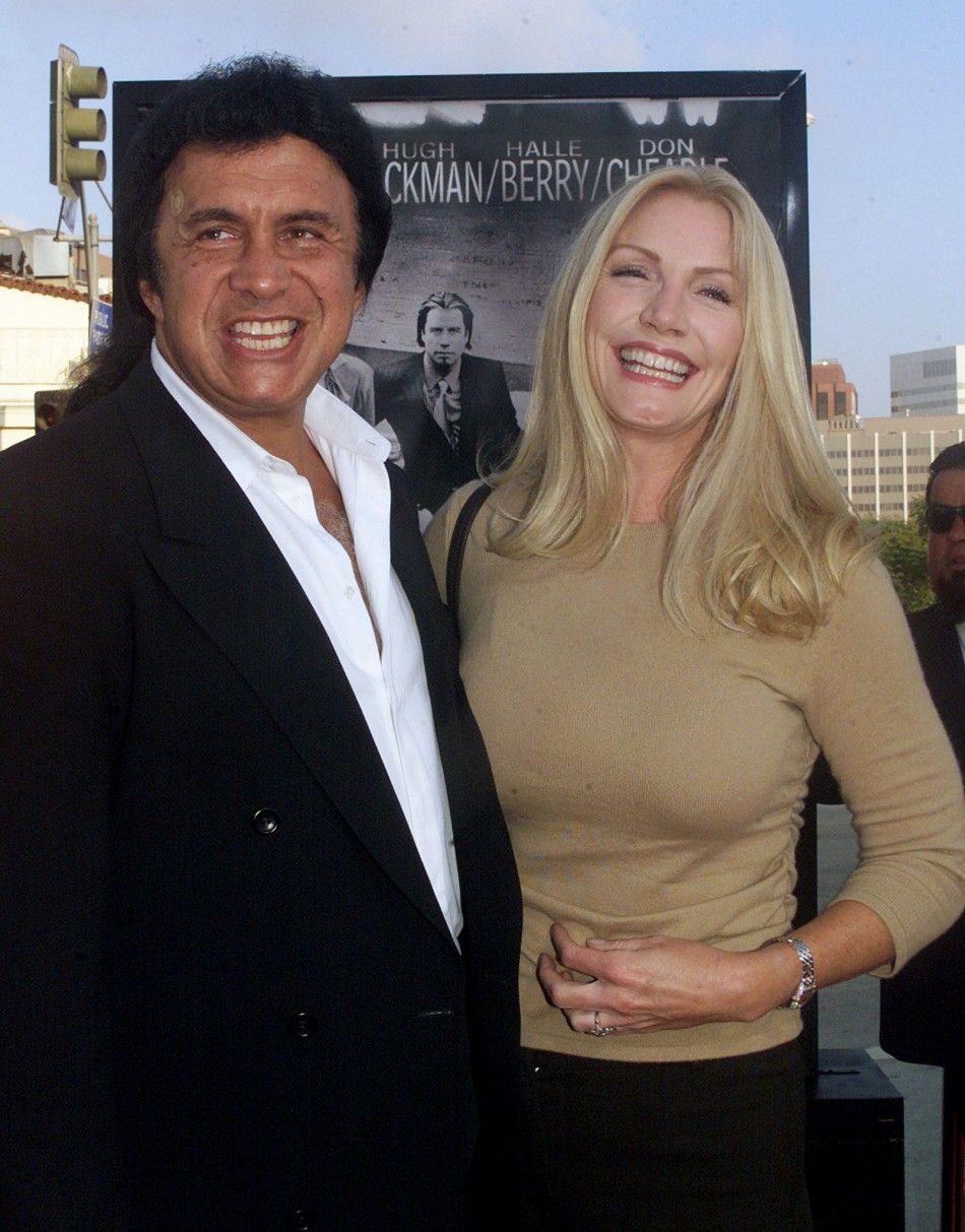 Gene Simmons of the rock group quotKISSquot and Shannon Tweed arrive as guests for the premiere of the new action drama film quotSwordfishquot in Los Angeles June 4, 2001.