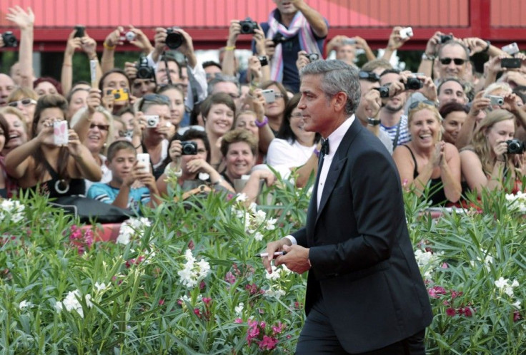 U.S. actor George Clooney arrives on the "The Ides of March" red carpet at the 68th Venice Film Festival in Venice