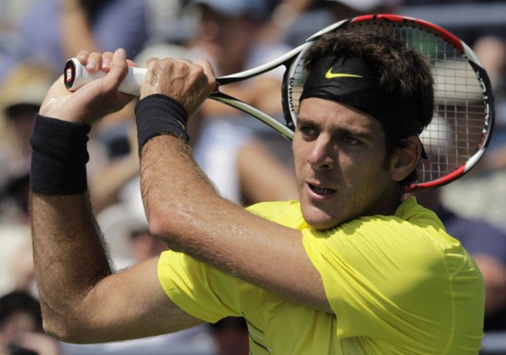 Juan Martin Del Potro of Argentina hits a return to compatriot Diego Junqueira during their match at the U.S. Open tennis tournament in New York