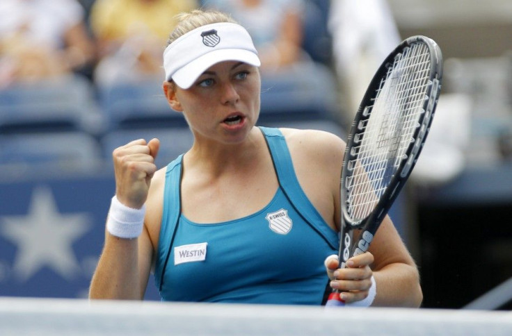 Vera Zvonareva of Russia celebrates a point against Anabel Medina Garriguess of Spain during their match at the U.S. Open tennis tournament in New York