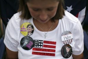 A supporter of former Governor of Alaska Sarah Palin attends a rally organized by the Tea Party of America in Indianola, Iowa
